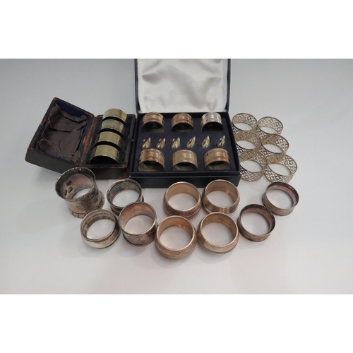 4342 - A box of napkin rings including silver  (R)  £30