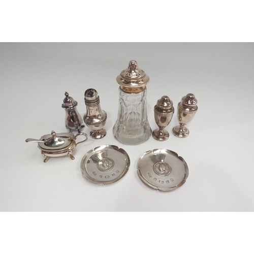 4349A - A selection of silver including a sugar sifter stamped Birmingham, pepperettes, Silver Jubilee Comme... 