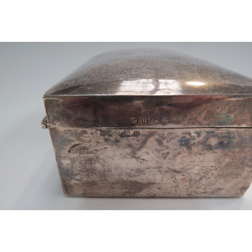 4352 - A George V silver cigarette box, the lid engraved with initials and dated 1920