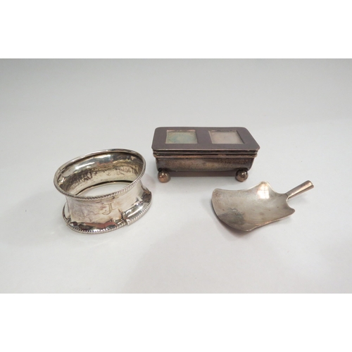 4354 - A silver double stamp case, silver napkin ring and spoon bowl