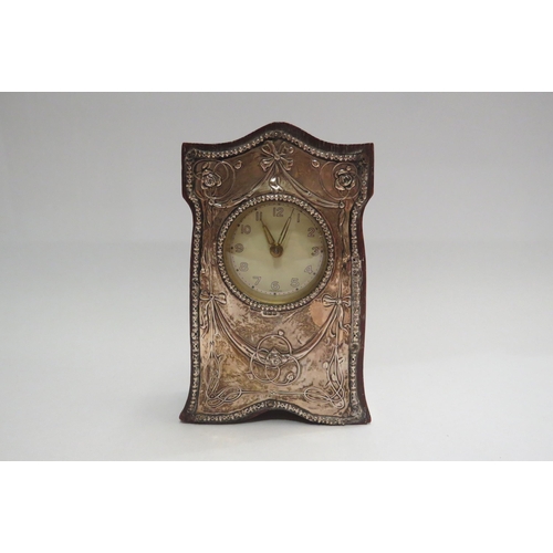 4358 - A silver fronted Art Nouveau timepiece, 14.5cm tall