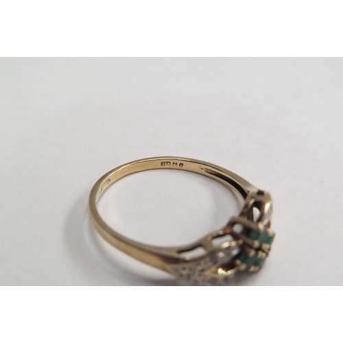 4403 - A 9ct gold, emerald and diamond set ring.  Approximately 1.7g, size O