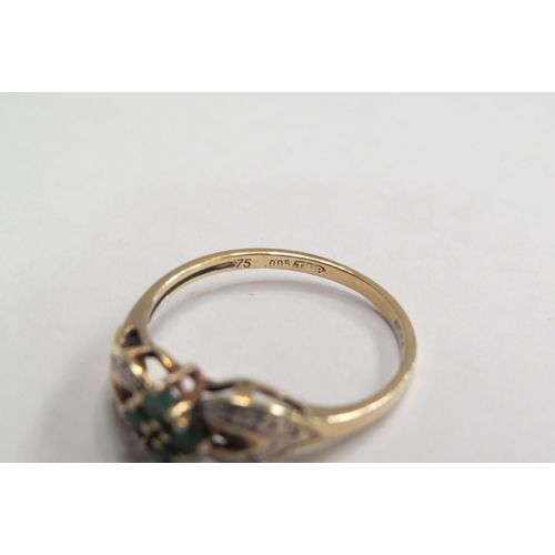 4403 - A 9ct gold, emerald and diamond set ring.  Approximately 1.7g, size O