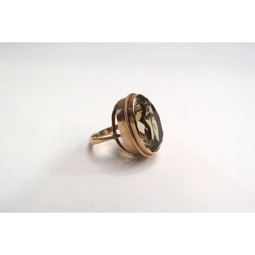 4408 - A 9ct gold stone set ring. Approximately 4.7g