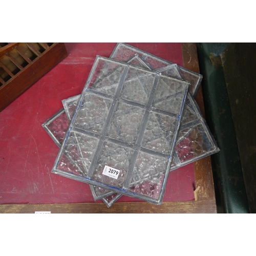 2077 - Four 19th Century lead glass window panels 34cm x 27cm