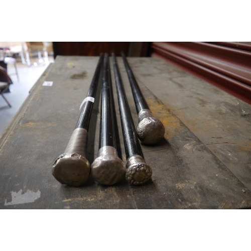 2208 - Four silver topped walking canes   (R) £100