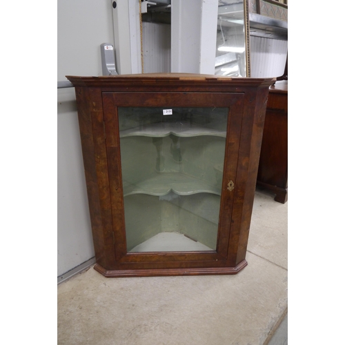 2168 - An Edwardian walnut corner unit