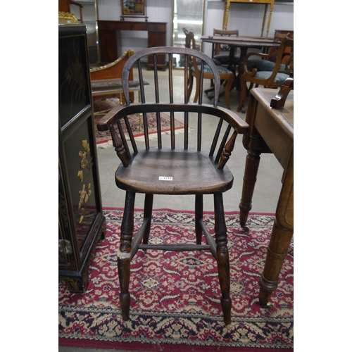 2188 - A 19th Century child's Windsor hoop-back chair, elm seated, on turned supports joined by a stretcher