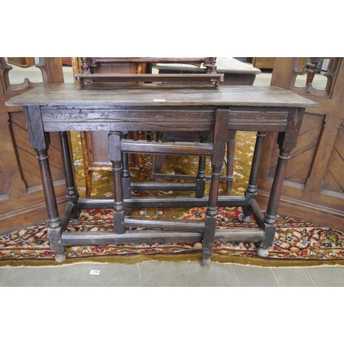 2177 - A 18th Century oak gate legged table panel top, converted to a hall table