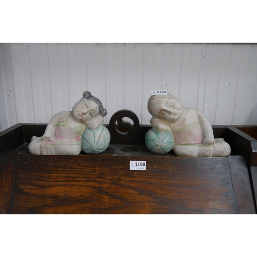 2121 - A pair of wooden painted Chinese bookends, male and female   (C)