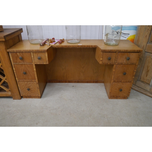 2301 - An oak dressing table with eight drawers   (R) £20