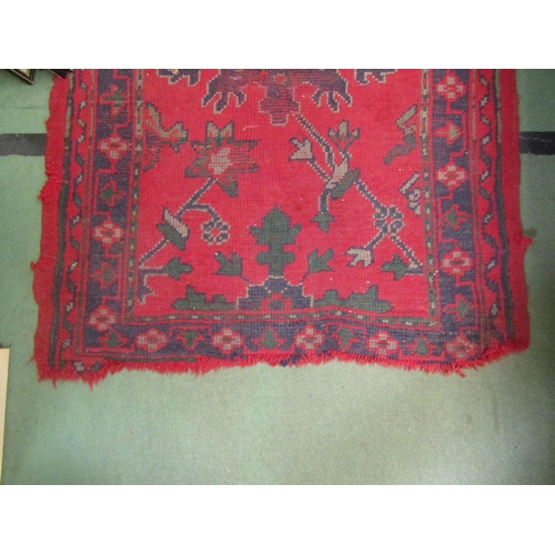4210 - A red and blue ground wool rug, 150cm x 90cm    (R) £10