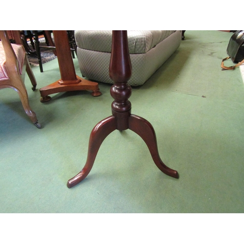 4233 - A mahogany circular tilt-top wine table on baluster turned column and tripod base, 68.5cm tall x 49c... 