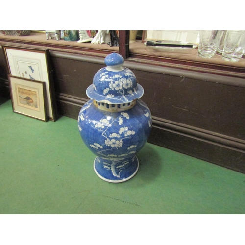 4245 - A 20th Century Oriental bowl with butterfly detail, 26cm diameter, and a blue and white lidded vase,... 