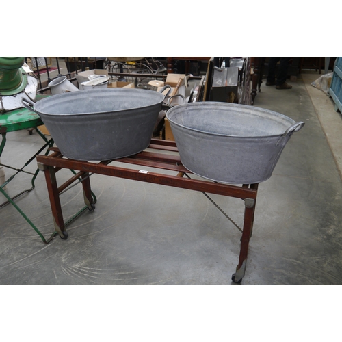 2026 - A Canadian folding wash bench with two galvanized tubs by Beatty Bros Ltd. Fergus