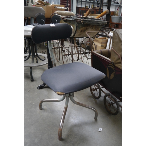 2046 - A Tad-sadd metal swivel adjustable engineers chair