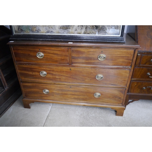 2114 - A 19th Century mahogany chest of two over two drawers   (R) £40