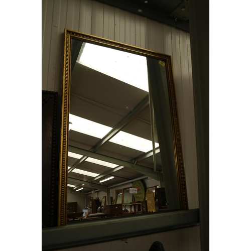 2141 - A gilt framed mirror with bead detail   (E) £5-10