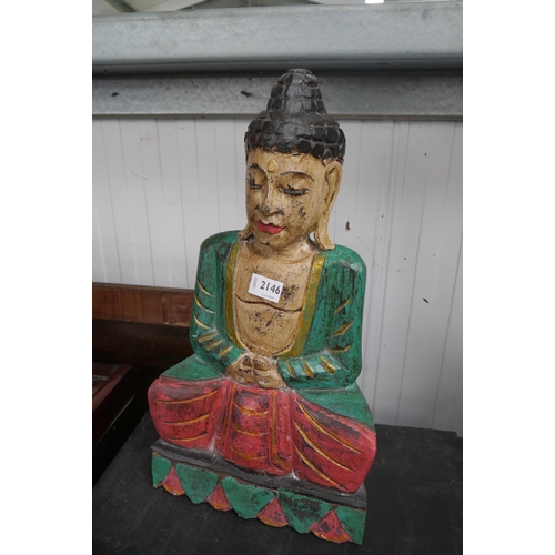 2146 - A multicoloured painted wooden Buddah, 50cm tall