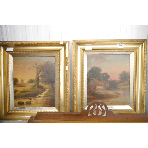 2164 - Two Victorian gilt framed oil on canvas of country cottages