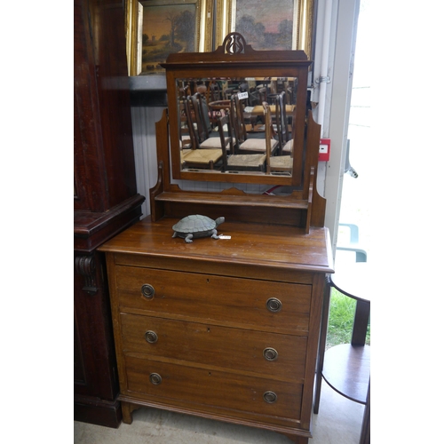 2165 - A 1930s oak three drawer dressing chest