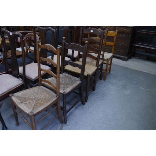 2180 - Two oak chairs ladderback chairs with sea grass seats