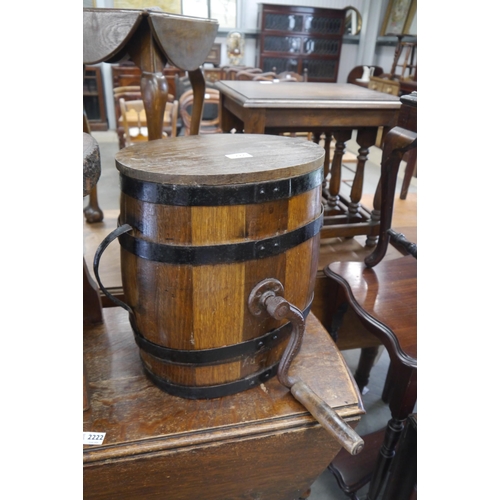 2223 - A Victorian oak and metal bound butter churn