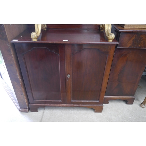 2226 - A mahogany two door cupboard