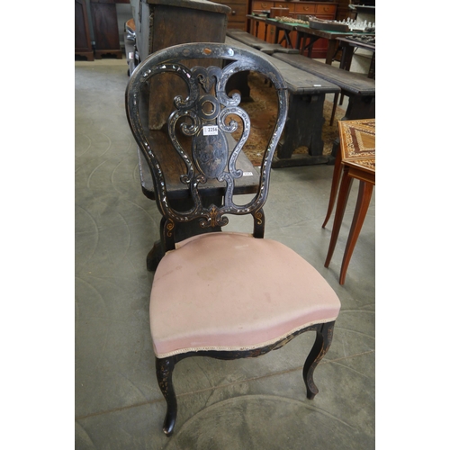 2256 - A Victorian French ebonised chair with mother of pearl