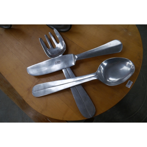 2261 - An alloy knife, fork and spoon wall display, approximately 60cm each