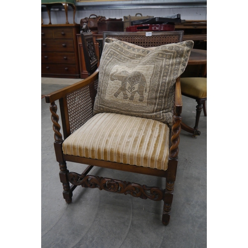 2263 - An Edwardian oak bergere chair