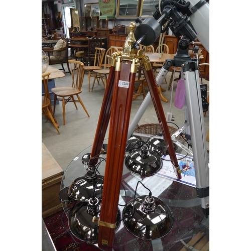 2280 - A mahogany and brass height adjustable tripod