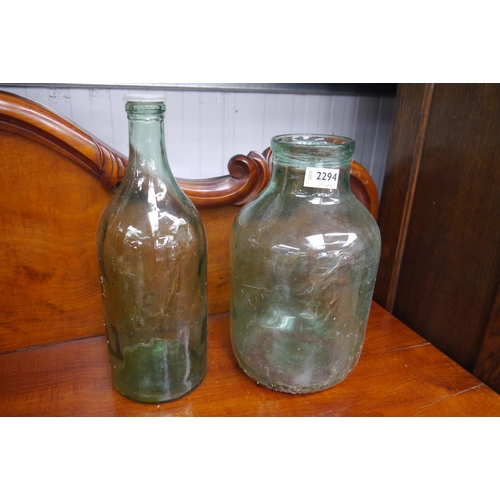 2294 - A large green bottle one wide mouthed and one small with stopper