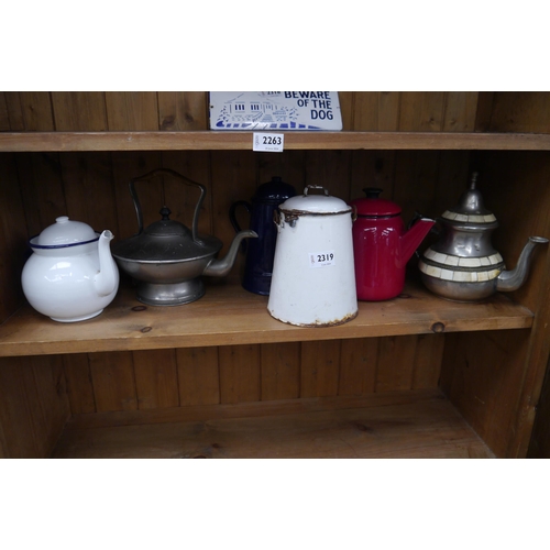 2319 - Five vintage kettles and an enamel pot