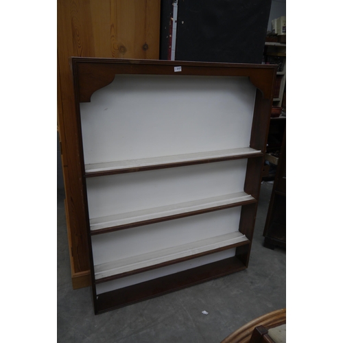 2327 - A mahogany wall mounted three tier plate rack   (E) £10-15