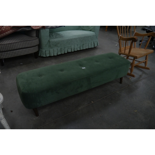 2343 - A green velvet ottoman