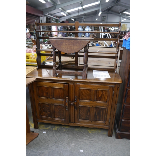 2458 - An Ercol dresser with platerack top