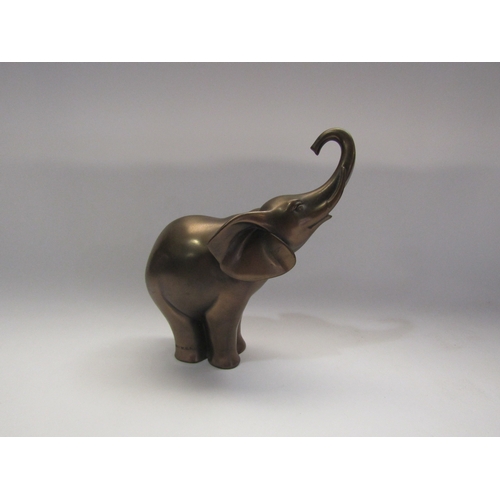 4289 - A bronzed figure of an elephant, 18cm tall