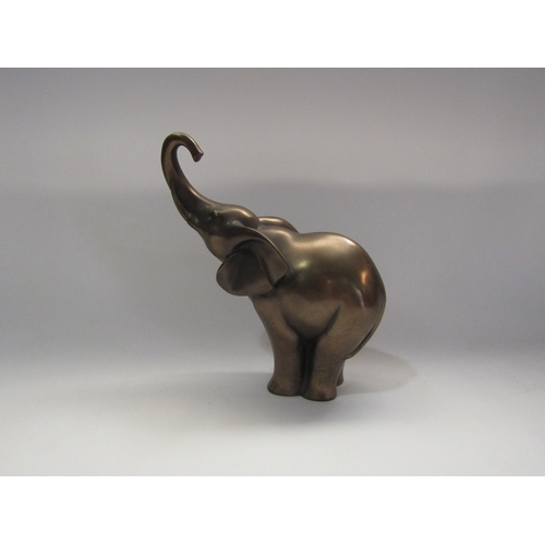 4289 - A bronzed figure of an elephant, 18cm tall