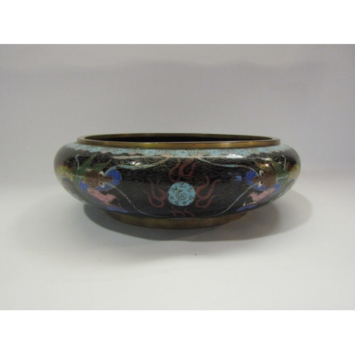 4302 - A 20th Century Cloisonne shallow bowl with dragon chasing the pearl design, 20cm diameter