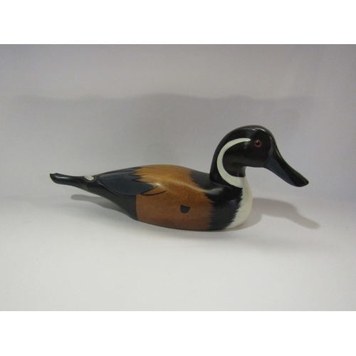 4307 - A carved wooden figure of a duck, 39cm long     (R) £20