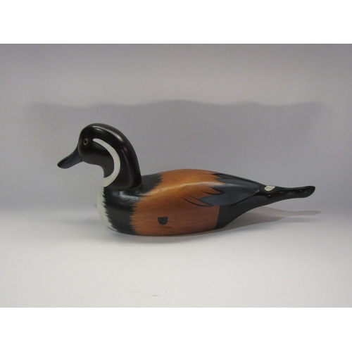 4307 - A carved wooden figure of a duck, 39cm long     (R) £20