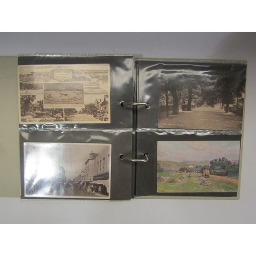 4315 - Two albums containing a quantity of topographical postcards, approximately 250