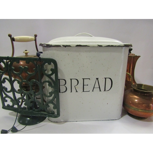 4327 - A copper hot water jug and ewer, bread bin and recipe book stand