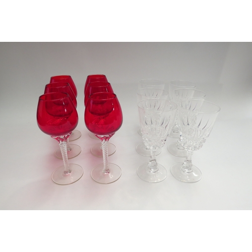 4448 - A set of six ruby glasses with twisted stems and six clear moulded glasses  (E)  £10-20