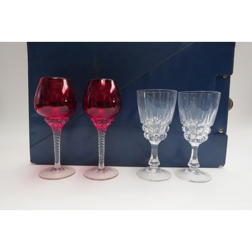 4448 - A set of six ruby glasses with twisted stems and six clear moulded glasses  (E)  £10-20