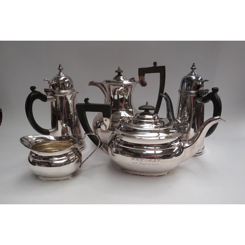 4449 - An EPNS three piece tea and coffee set.  A 20th Century silver plated chocolate pot and hot water ju... 