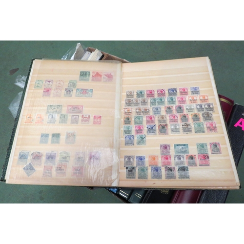 4472 - A collection of postage stamps of the World, principally first half of 20th Century onwards, two box... 