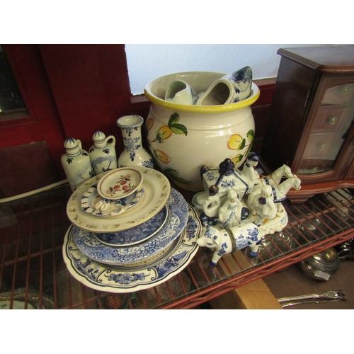 4483 - A collection of Delft and similar ceramics including horse-drawn carriage, clock a/f and clogs toget... 