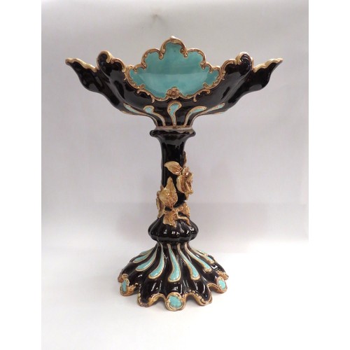 4425 - A Wilhelm Schiller & Sons majolica table centrepiece, ornate scrolled gilt border, 41.5cm high a/f  ... 